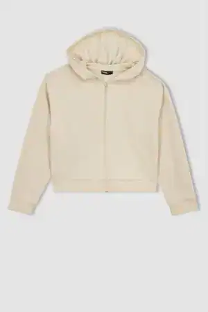 Cream zip-up hoodie with hood and long sleeves for women.